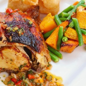 Grilled chicken with potato salad, rice and a thousand island salad