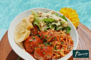 Spaghetti and meatballs with caesar salad