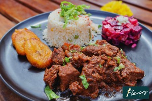 Goatstew (Kabritu stoba) with rice and red beets salad