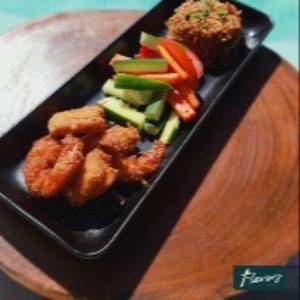 Coconut Shrimp with fried rice and carrot sticks