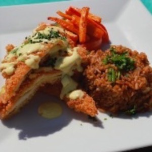 Chicken tenders with fried rice and carrot sticks