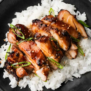Grilled Teriyaki Chicken with rice, vegetable mix and a pumpkin croquette